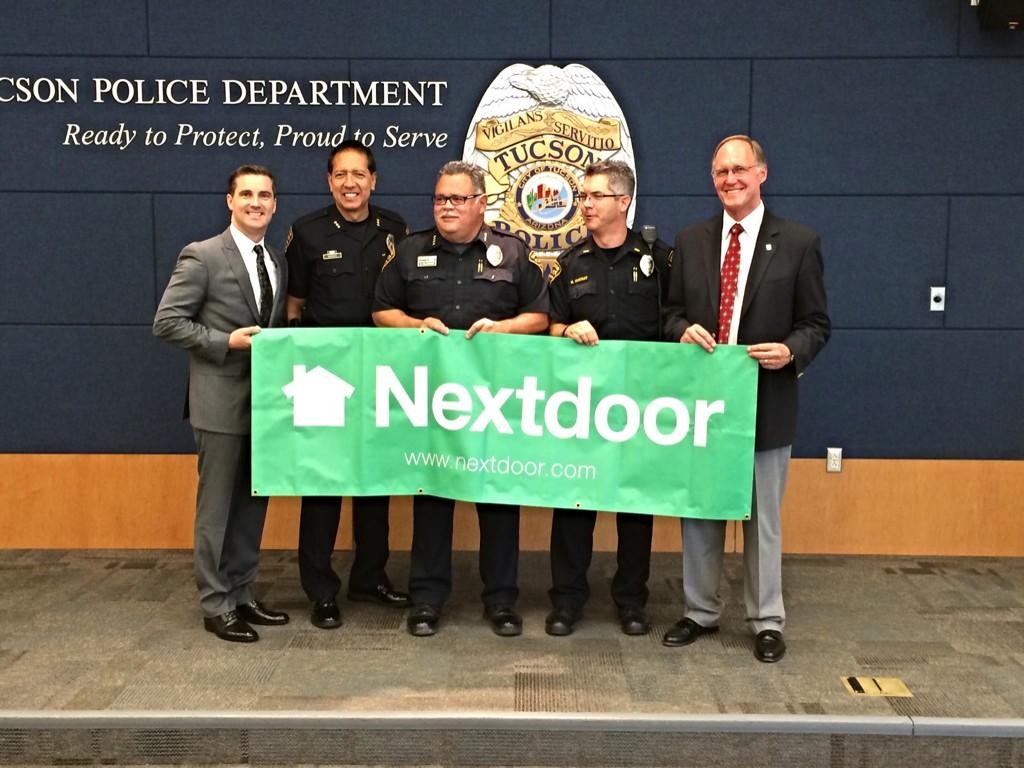Jeremie celebrating a partnership announcement with the Tucson Police Department.