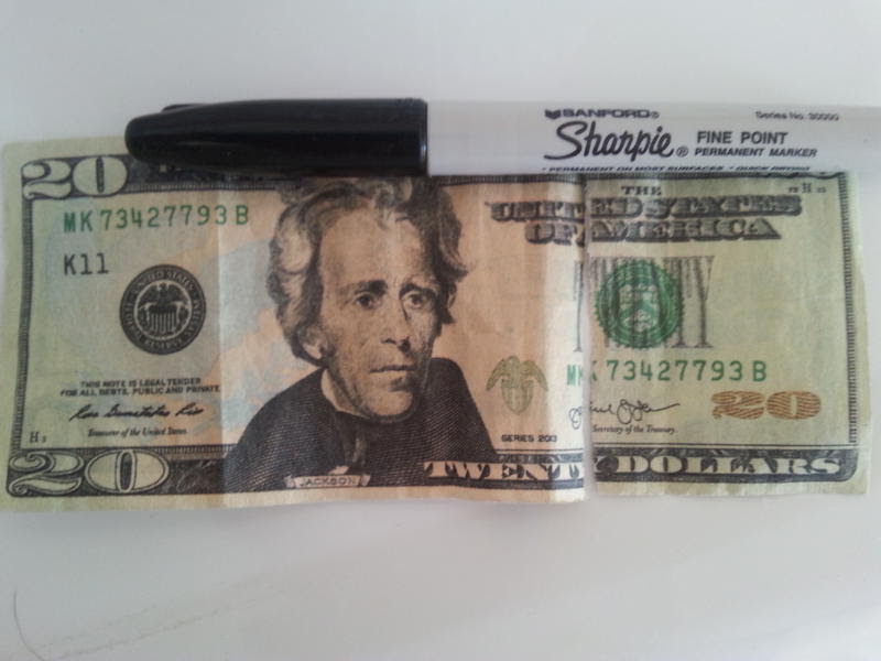 The fake $20 David received at the yard sale. Police later arrested the man who was using them to purchase items.